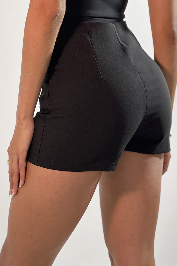 Falda-Short 1820028 con cierre lateral silueta ajustada para mujer. Elaborada en poliéster spandex dyaboo color negro 2