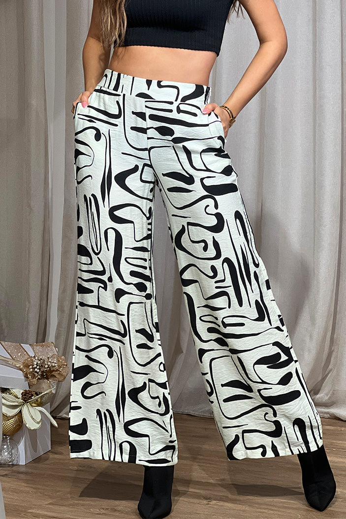 Pantalón DF06108 Pantalón recto silueta amplia para mujer. Elaborado en chalís. dyaboo crudo