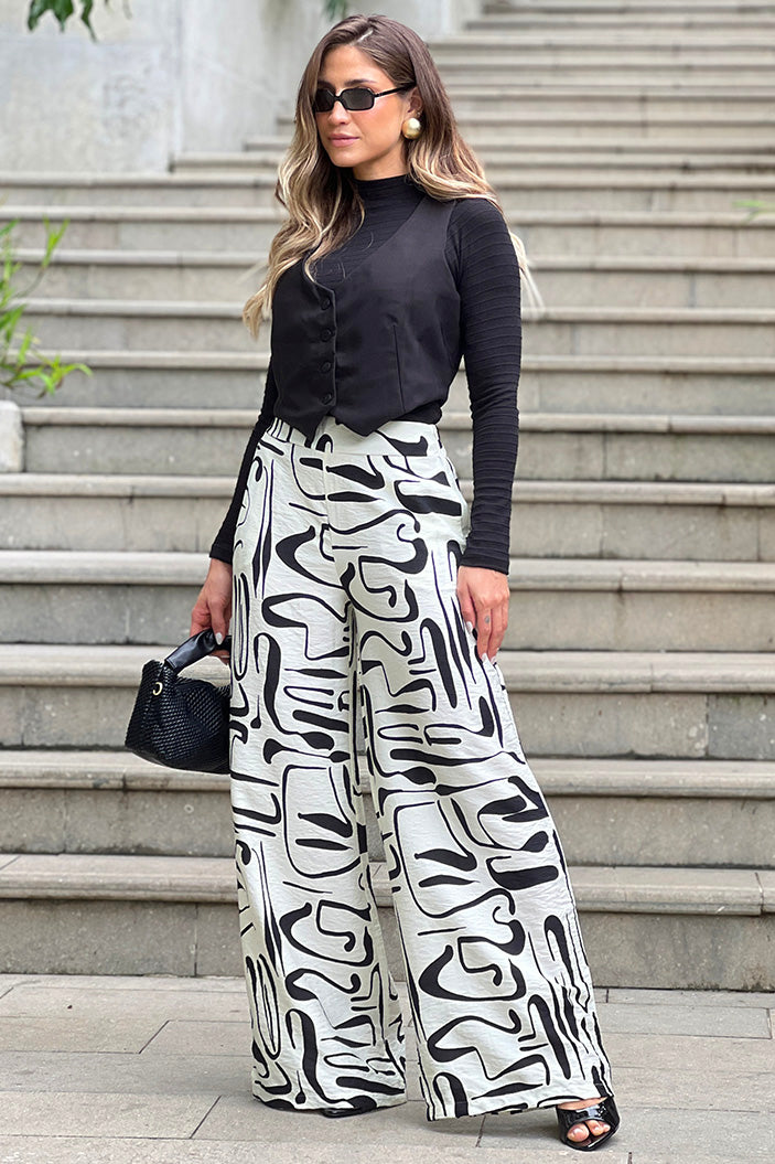 Pantalón DF06108 silueta amplia para mujer. Elaborado en chalís dyaboo crudo